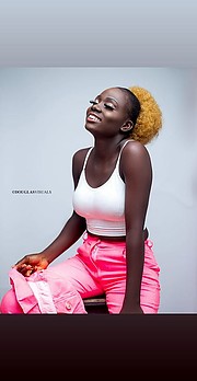 Barakat Olaniyi model. Photoshoot of model Barakat Olaniyi demonstrating Fashion Modeling.My photographer and my self with my make up artist Modeling have been my dream work It is a job that inspire me about my complexion When I was in secondary sc