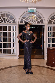 Brunah Ogutu fashion designer. Photoshoot of model Brunah Ogutu demonstrating Fashion Modeling.Kache designs by Angie at Norfolk hotelFashion Modeling Photo #215815