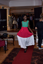 Brunah Ogutu fashion designer. Photoshoot of model Brunah Ogutu demonstrating Runway Modeling.Kache designs by AngieRunway Modeling Photo #215817