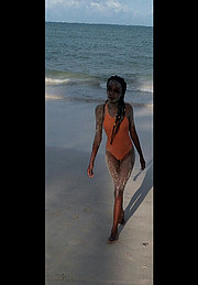 Cate Brenda Wanjiku model. Photoshoot of model Cate Brenda Wanjiku demonstrating Face Modeling.Face Modeling Photo #196021