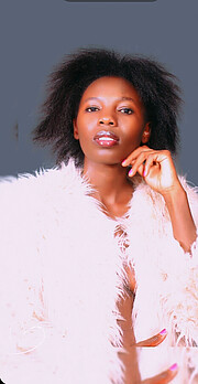 Clare Murumba model. Photoshoot of model Clare Murumba demonstrating Face Modeling.Photo shoot @finch creations in Nairobi Kenya Fur outfit @Evashop Nairobi Make up @Clemum19Face Modeling Photo #248198