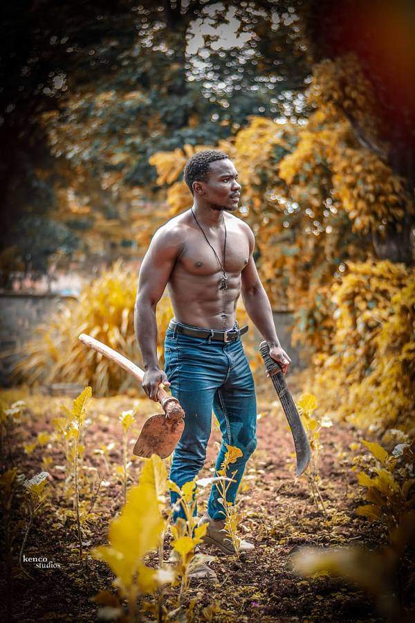 Derricks Bee freelance model. Photoshoot of model Derricks Bee demonstrating Body Modeling.The photo credids goes to (Kenco photography) kakamega kenya.The picture is a creative idea showing all the hardwork we endure to make every end meet and be