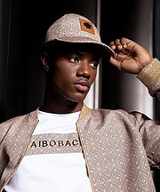 Donell Banze model. Photoshoot of model Donell Banze demonstrating Editorial Modeling.Clothing campaign photoshoot for high fashion Mozambican brand Taibo BacarEditorial Modeling Photo #249105