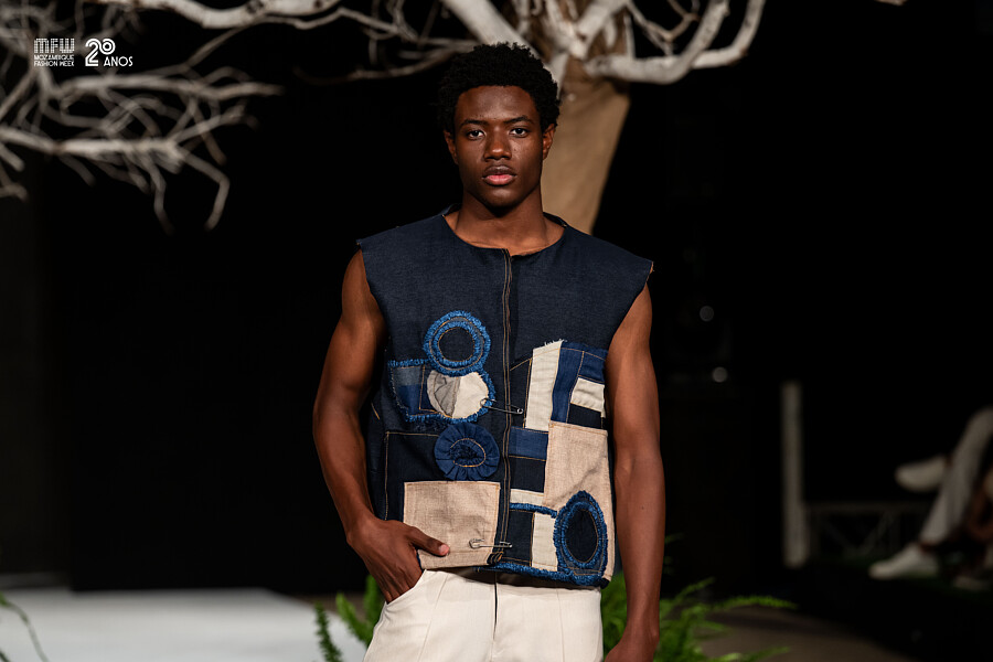 Donell Banze model. Photoshoot of model Donell Banze demonstrating Fashion Modeling.Mozambique Fashion Week runway show 2025. Zimbabwe designer Kuki SanbanBrand: SoleilFashion Modeling Photo #249111