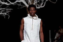 Donell Banze model. Photoshoot of model Donell Banze demonstrating Runway Modeling.Mozambique Fashion Week runway show Designer: Naked ApeRunway Modeling Photo #249116