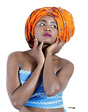 Doreen Keziah hair model. Photoshoot of model Doreen Keziah demonstrating Face Modeling.successful head wraps project with black gold productionFace Modeling Photo #151750