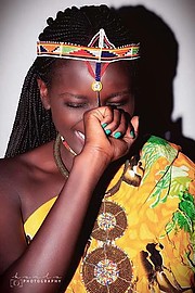 Gaudencia Betina Awuor model. Photoshoot of model Gaudencia Betina Awuor demonstrating Face Modeling.Photgrapher; KeiloOutfit: Curio KenyaFace Modeling Photo #221041