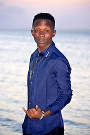 George Komora model. Photoshoot of model George Komora demonstrating Fashion Modeling.PHOTO captured by Amani Studio LamuKenyaFashion Modeling Photo #219079