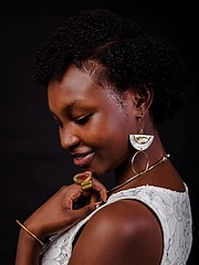 Grace Mugire model. Photoshoot of model Grace Mugire demonstrating Face Modeling.This photo was taken by a photographer by the name (Dan shutter). I was approached by a natural hair company (Sheth Naturals) to help promote a campaign (#Dauntless ca