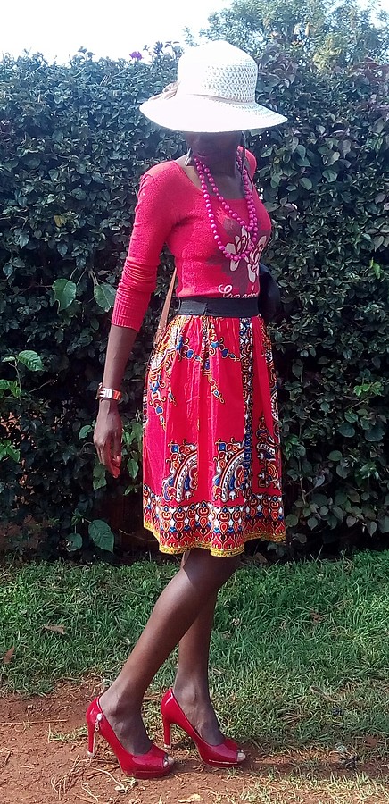 Jane Njeri model. Photoshoot of model Jane Njeri demonstrating Fashion Modeling.Very cheap clothes and simple lady I am...just tried to match themHatFashion Modeling Photo #187387