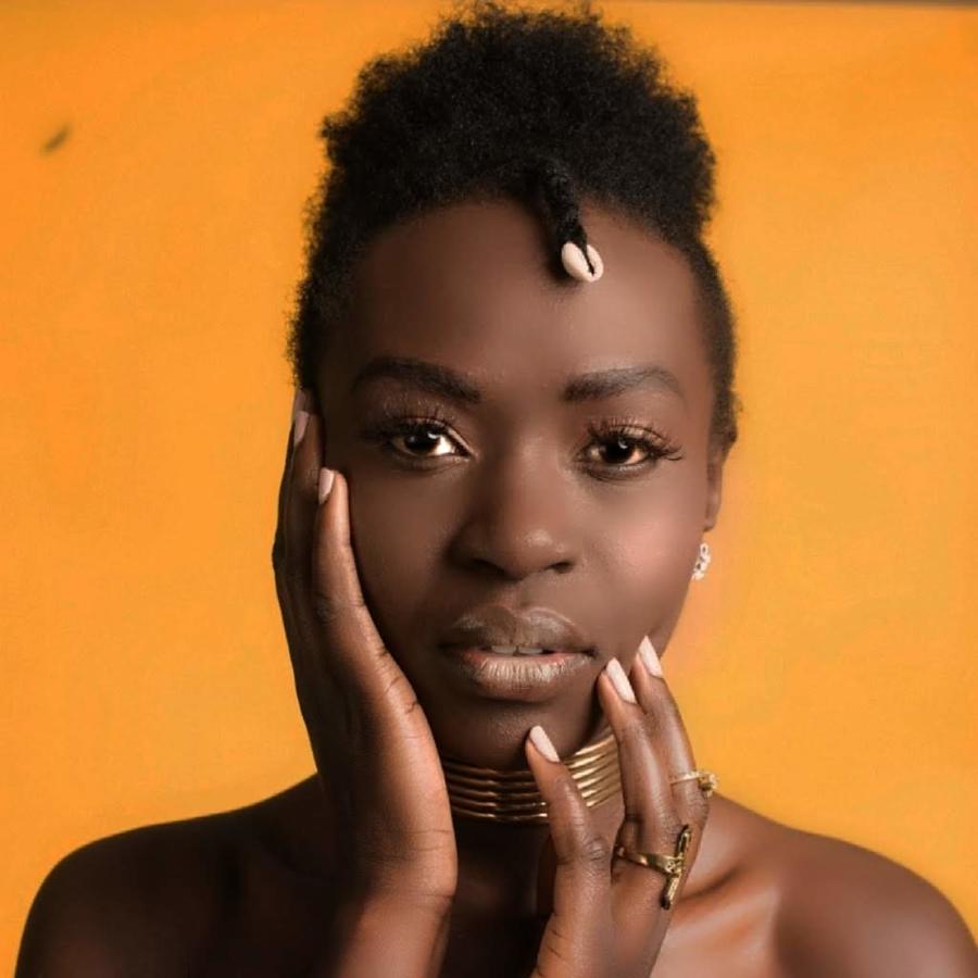 Joan Mokoro model. Photoshoot of model Joan Mokoro demonstrating Face Modeling.Face Modeling Photo #209850