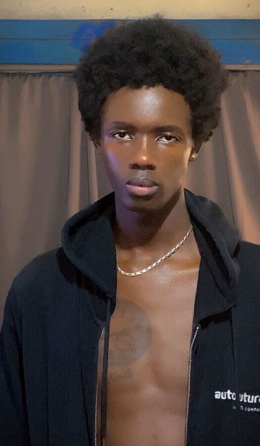 Kevin Kaunda professional male model. Photoshoot of model Kevin Kaunda demonstrating Face Modeling.Face Modeling Photo #243466