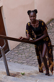 Laura Auma Ogendo is a professional Kenyan model based in Munich, Germany, with extensive experience in high-fashion, commercial, and runway