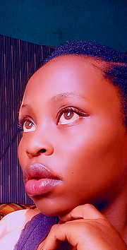 Lucy Maina model. Photoshoot of model Lucy Maina demonstrating Face Modeling.Lucy Maina - Make up artistBrian Kariuki - Professional Hair StylistFace Modeling Photo #226323