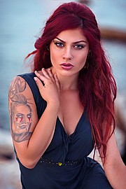 Rita Inked is a professional tattoo model based in Greece. She lives in Thessaloniki. Her work experience includes photoshoots and fashion s