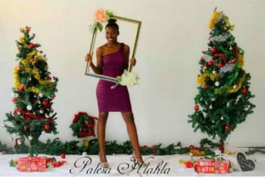 Palesa Hlahla model. Photoshoot of model Palesa Hlahla demonstrating Fashion Modeling.Christmas photo shoot. Photographer Lati Mothapo. Dress by the style design. Edited by Enoch NgoashengFashion Modeling Photo #195107