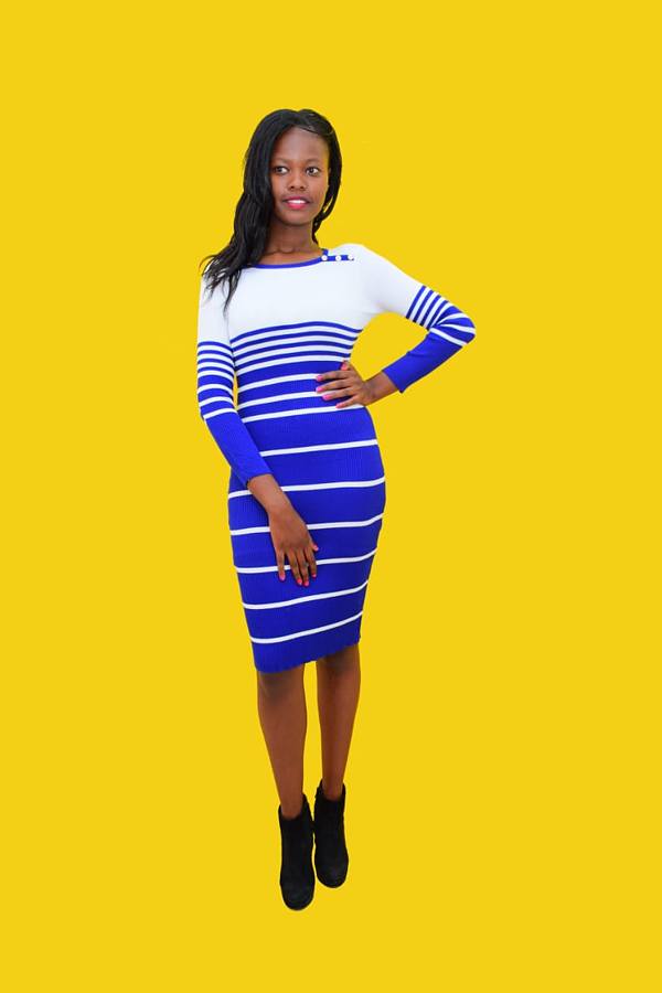 Purity Njeri model. Photoshoot of model Purity Njeri demonstrating Fashion Modeling.Photo shoot in Transavvy studios. Photo was taken by (Martin). The model is (Purity Njeri) wearing a a blue and white stripes dressFashion Modeling Photo #229202