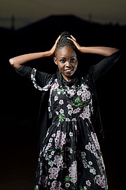 Racheal Iradukunda model. Photoshoot of model Racheal Iradukunda demonstrating Fashion Modeling.The photos were taken by Henry Guyali of B-leaf photography at Mwihoko, Kenya.Wearing dresses from gikomba local market in Nairobi Kenya, is model Rache