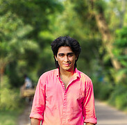 “Razin Rafi, 20, is a striking presence from Khulna, Bangladesh. With sharp features, controlled intensity, and a naturally commanding aura,
