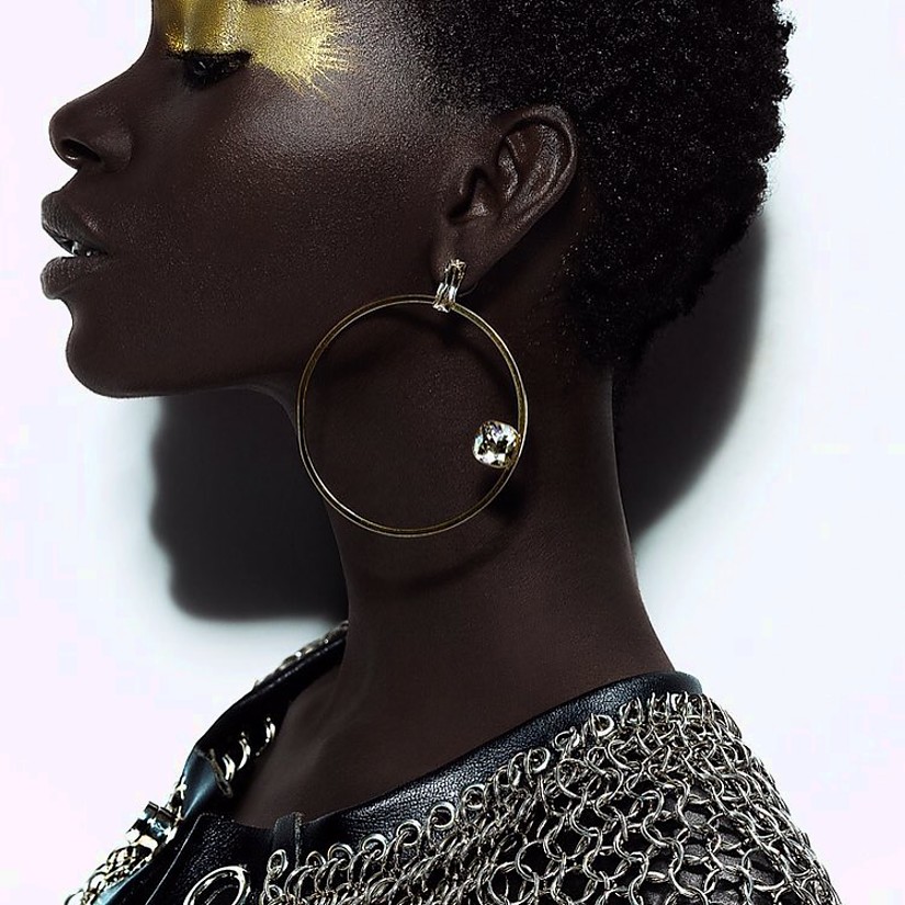 Romain Thevenin fashion designer (cr&#233;ateur). Modeling work by model Adja Kaba.model: Adja KabaEarrings Photo #192084